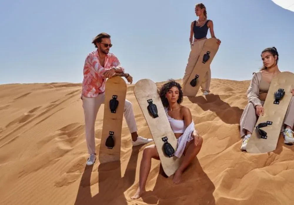 sandboarding-on-the-dubai-desert-dunes-noble-morning-safari
